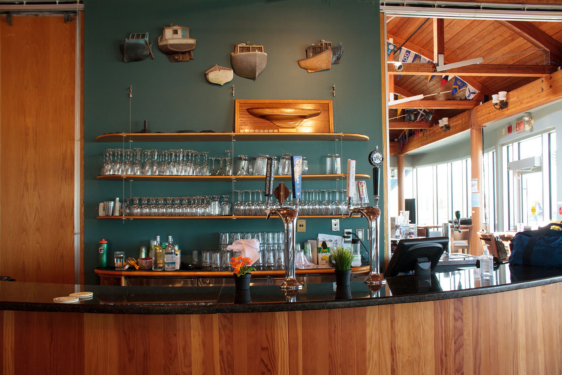 Bar with glasses on shelves