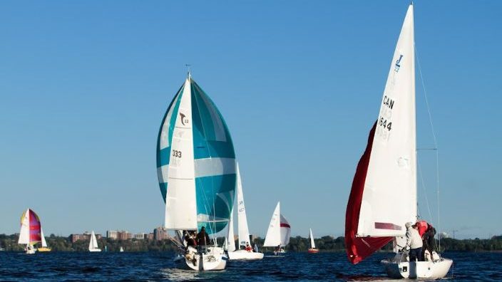 Sailboats with spinnakers racing downwind