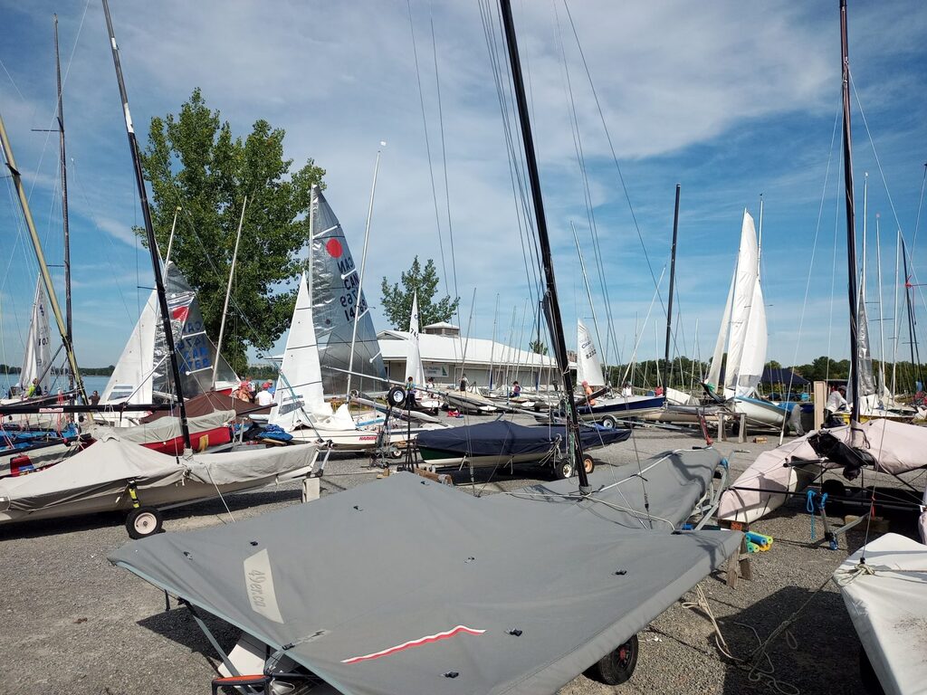 Busy dinghy yard with boats being prepared