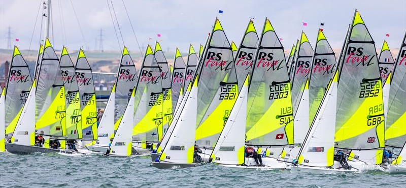 RS Feva sailboats on start line